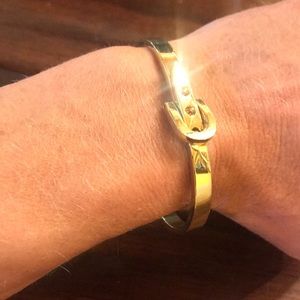 Adjustable Gold toned belt style bracelet